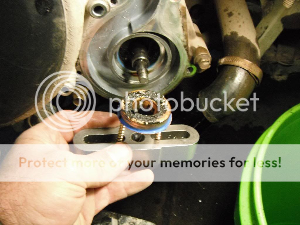 Water Pump Seal and Oil Seal Replacement on 2006 Sportsman 700 Pics